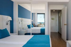 Cama ou camas em um quarto em Alexandre Grand Teguise Playa