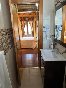 Ванна кімната в Hostal segovia adults only