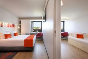 Uma cama ou camas num quarto em Star Inn Porto