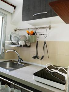 Gallery image of piccolo monolocale con angolo cottura in Parma