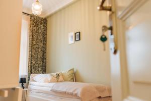 Postel nebo postele na pokoji v ubytování Apartamenty Optimal