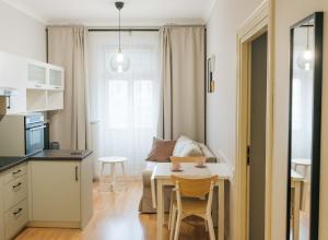 Kuchyň nebo kuchyňský kout v ubytování Apartamenty Optimal