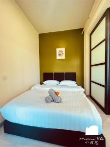 Maison life 小居屋 Jesselton Quay CityPads客房内的一张或多张床位