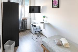 TV a/nebo společenská místnost v ubytování Elite Home