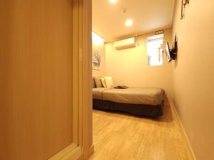 Ліжко або ліжка в номері OYO Hostel Myeongdong 1