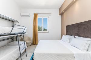 Letto o letti in una camera di Hotel Reverse