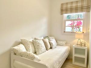 Posteľ alebo postele v izbe v ubytovaní Casa Boticaria, bonito Paraíso Privado con jardín y Jacuzzi.