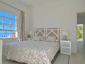 Posteľ alebo postele v izbe v ubytovaní Casa Boticaria, bonito Paraíso Privado con jardín y Jacuzzi.