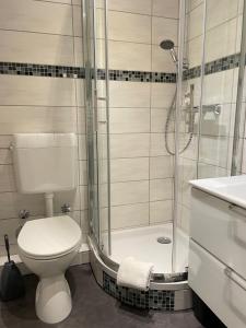 Ένα μπάνιο στο Ferienwohnung Lia