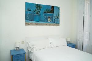 Postel nebo postele na pokoji v ubytování Guest House Éxito en Madrid