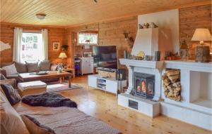 Et sittehjørne på Awesome Home In Leira I Valdres With Sauna And 3 Bedrooms