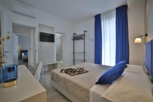 Imagen de la galería de Calaluna Rooms, en Porto Cesareo