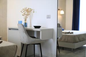 Imagen de la galería de Calaluna Rooms, en Porto Cesareo