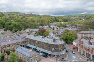 an overhead view of a town with buildings and a street at Victoria Parade in Rossendale