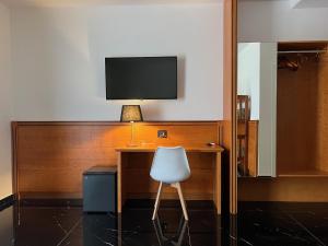 TV a/nebo společenská místnost v ubytování Hotel TEA - Praia a Mare
