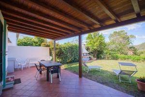 Zahrada ubytování Villetta Capo Bianco - HelloElba + 3 fotografie