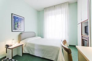 Postel nebo postele na pokoji v ubytování Hotel Molise 2