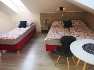 Posteľ alebo postele v izbe v ubytovaní City Center Apartments Lofty z klimatyzacją