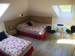 Posteľ alebo postele v izbe v ubytovaní City Center Apartments Lofty z klimatyzacją