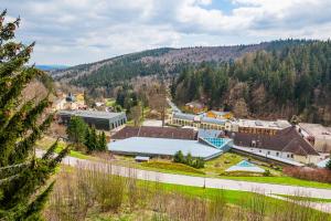 an aerial view of a small town in the mountains at Penzion Zámeček in Janske Lazne