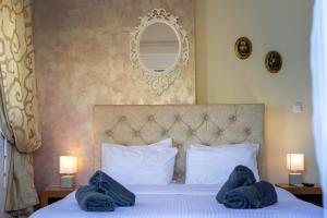Posteľ alebo postele v izbe v ubytovaní Votsalakia Hotel & Luxury Apartments