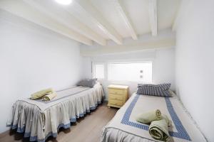 Postel nebo postele na pokoji v ubytování Piso con Encanto 2