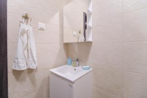 Vannituba majutusasutuses Apartment in the city center