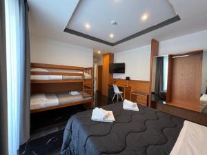 Postel nebo postele na pokoji v ubytování Hotel TEA - Praia a Mare