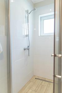 Kúpeľňa v ubytovaní Apartamenty Przylesie