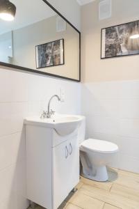 Kúpeľňa v ubytovaní Apartamenty Przylesie