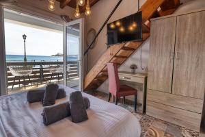 Posteľ alebo postele v izbe v ubytovaní Votsalakia Hotel & Luxury Apartments