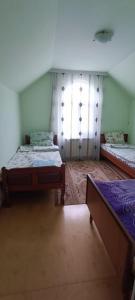 Tempat tidur dalam kamar di Sahil Baği