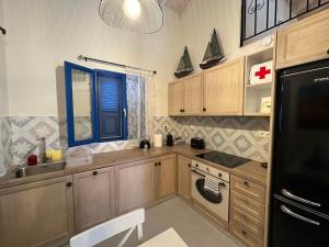 Kuchyň nebo kuchyňský kout v ubytování Casa Porphyra + 22 fotografií