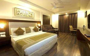 Postel nebo postele na pokoji v ubytování Hotel Le Roi Near New Delhi Railway Station