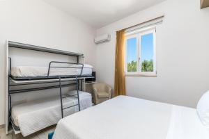 Letto o letti in una camera di Hotel Reverse