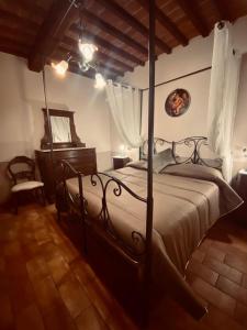 Postel nebo postele na pokoji v ubytování Locazione turistica ex Le Casette Di Cedromonte + 37 fotografií