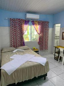 Postel nebo postele na pokoji v ubytování Pousada da Vovó