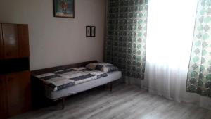 Postel nebo postele na pokoji v ubytování Dom v Obci Kusín