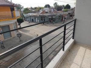 a balcony with a view of a street at La Bonita in Ezeiza