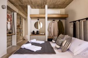 Postel nebo postele na pokoji v ubytování Apsila Pool Suites