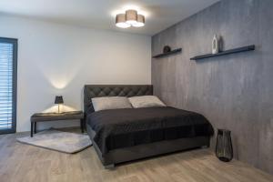 Postel nebo postele na pokoji v ubytování Apartmány Na Lánech