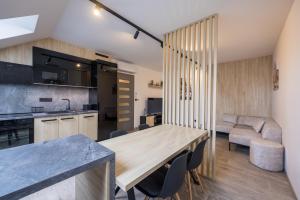 Kuchyň nebo kuchyňský kout v ubytování Apartmány Na Lánech