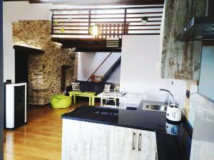 Kuhinja oz. manjša kuhinja v nastanitvi Casa das Pozas