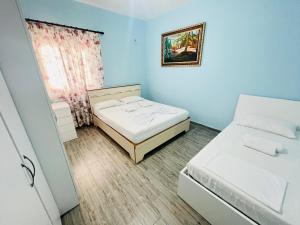 Postel nebo postele na pokoji v ubytování Jico Travel - Beach Apartment Santi