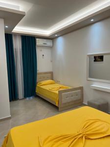 Ένα ή περισσότερα κρεβάτια σε δωμάτιο στο Hotel Arsenal