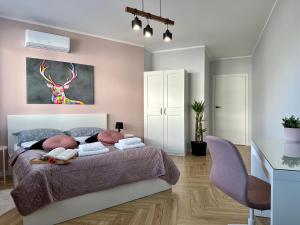 Posteľ alebo postele v izbe v ubytovaní Apartament Ukiel No9 z prywatnym dostępem do jeziora i siłownią