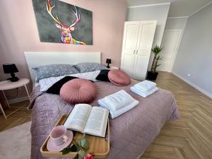 Łóżko lub łóżka w pokoju w obiekcie Apartament Ukiel No9 z prywatnym dostępem do jeziora i siłownią