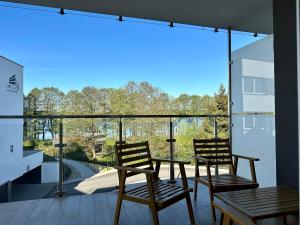 Balkon lub taras w obiekcie Apartament Ukiel No9 z prywatnym dostępem do jeziora i siłownią