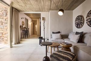Posezení v ubytování Apsila Pool Suites