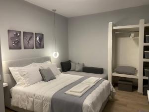 Voodi või voodid majutusasutuse Camelia luxury apartment toas